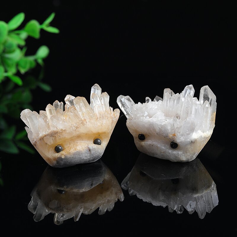 A natural white, shiny, clustered small hedgehog figurine carved from the original stone